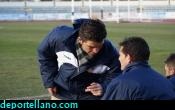 Jacobo y Rojas hablan durante el partido