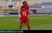 Granada celebra su gol con Encinas